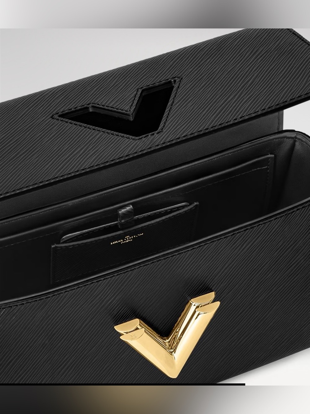 Louis Vuitton Twist MM Epi leather.  Black with gold